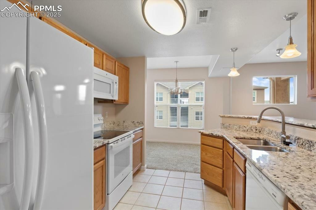 Property Photo: 605 Cougar Bluff Point 102 CO 80906