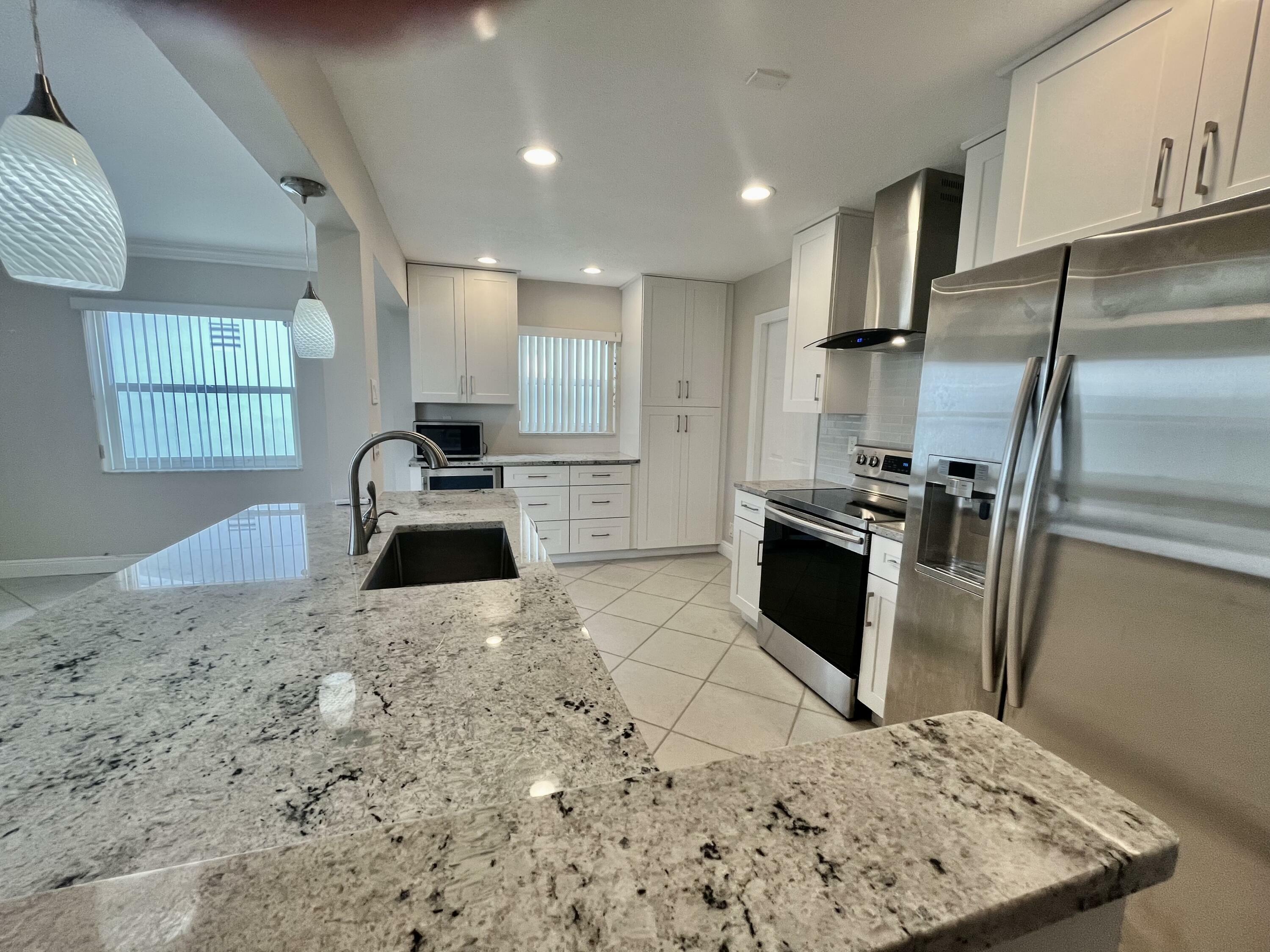 Property Photo:  2391 SW 11th Avenue  FL 33426 