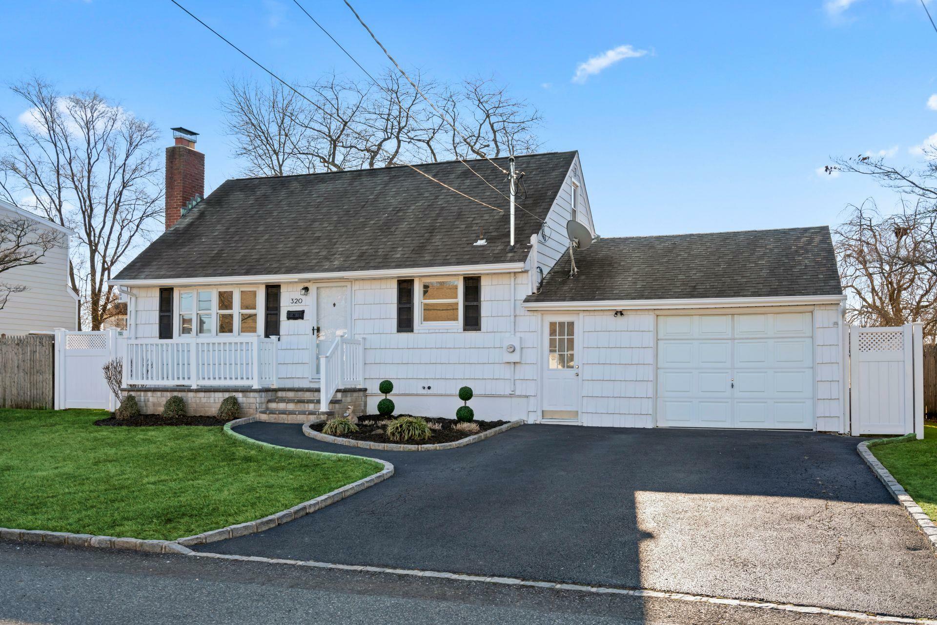 Property Photo:  320 Kurzon Road  NY 11795 