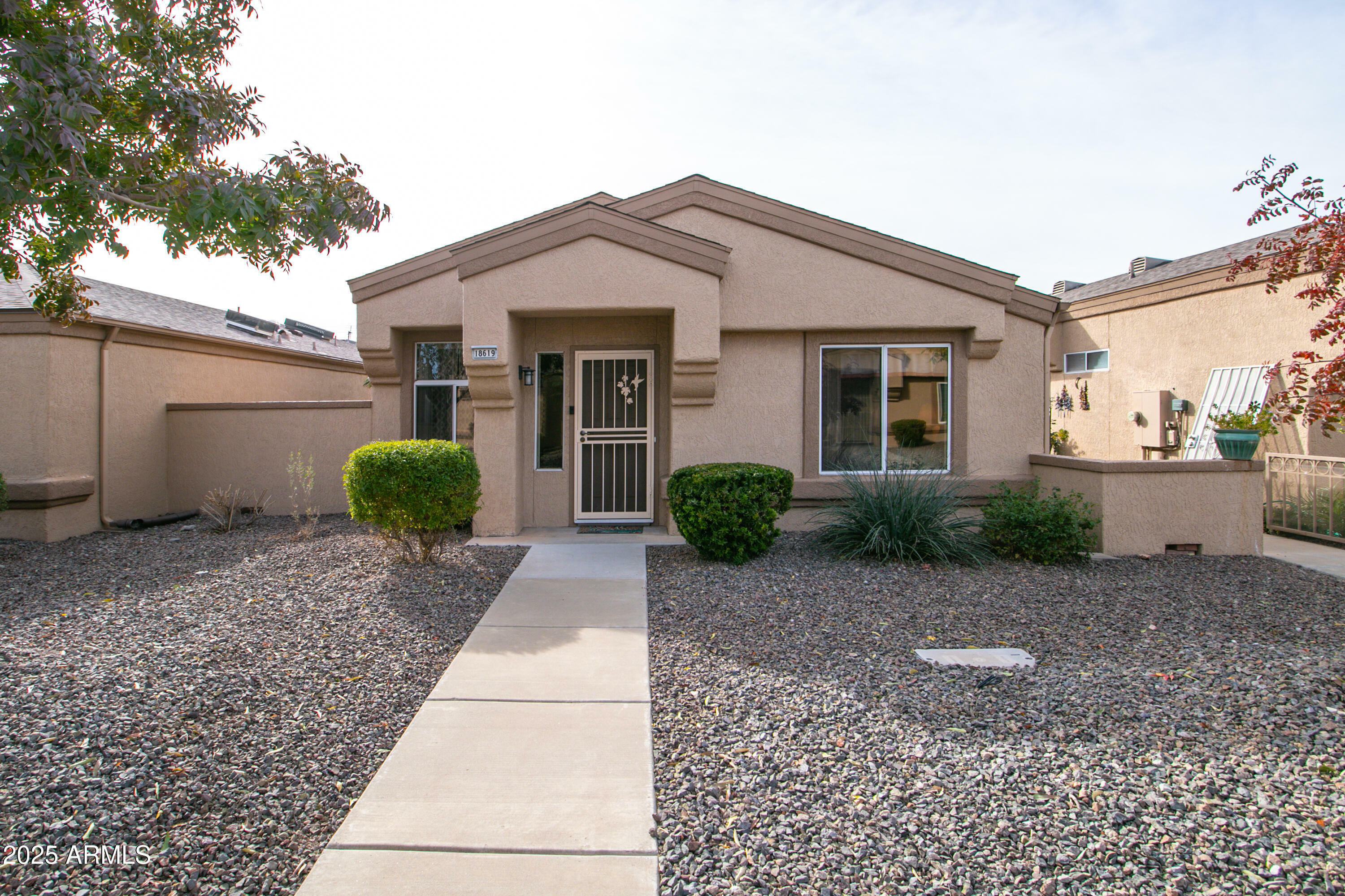 Property Photo: 18619 N 136th Drive AZ 85375