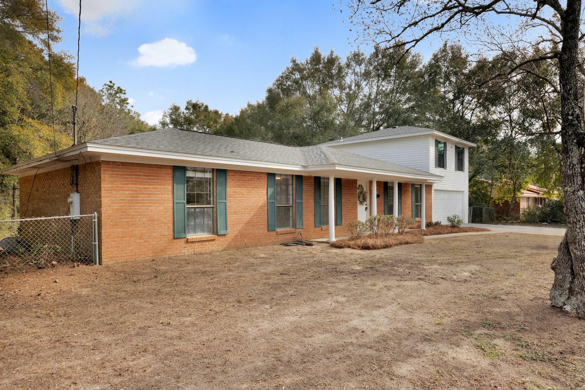 Property Photo:  5523 Aurora Drive  FL 32539 