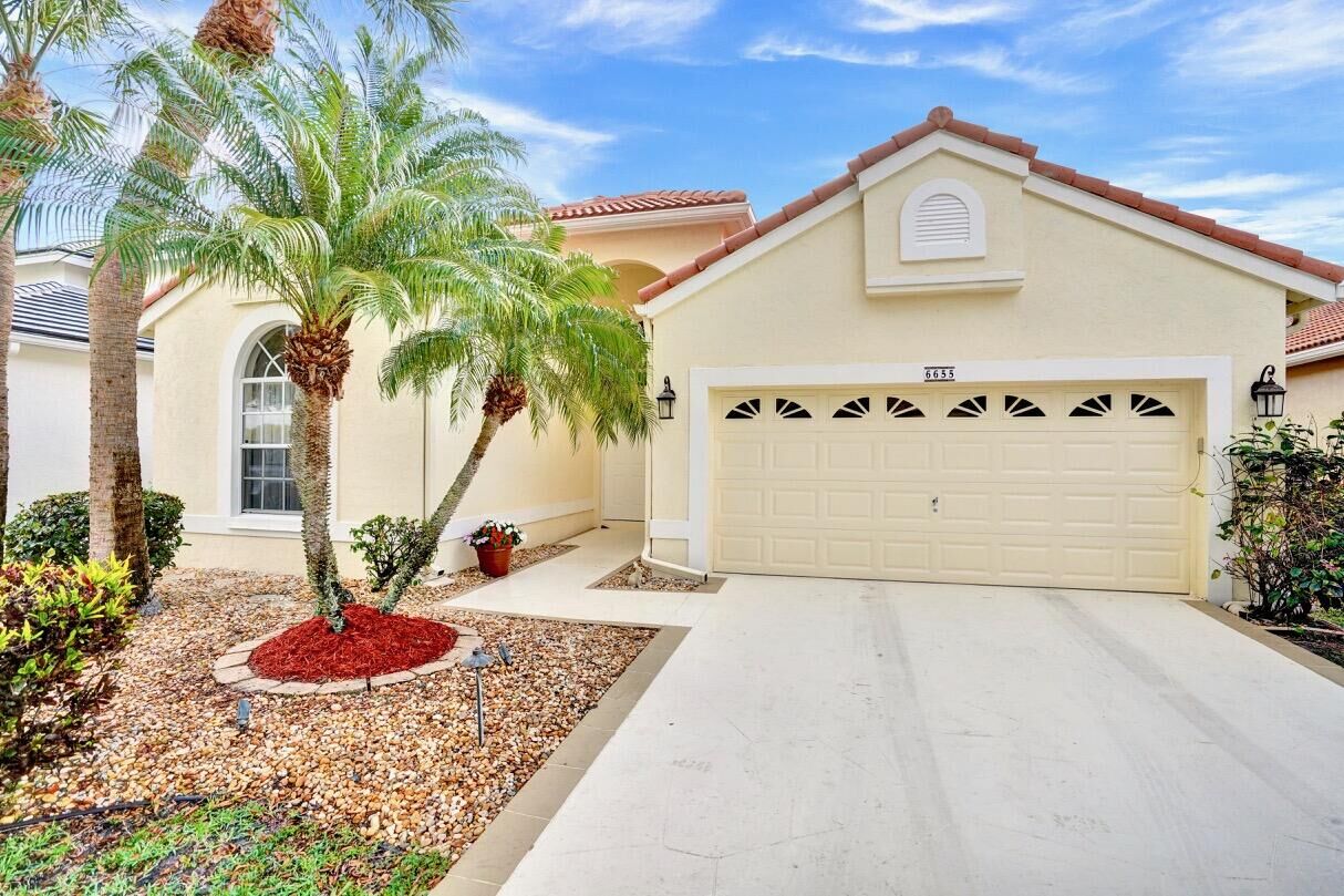 Property Photo:  6655 Remington Place  FL 33463 