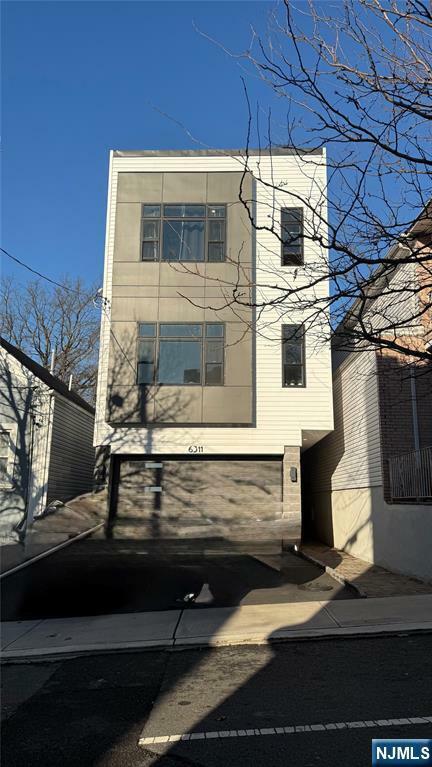 Property Photo:  6311 Polk Stree Polk 1  NJ 07093 