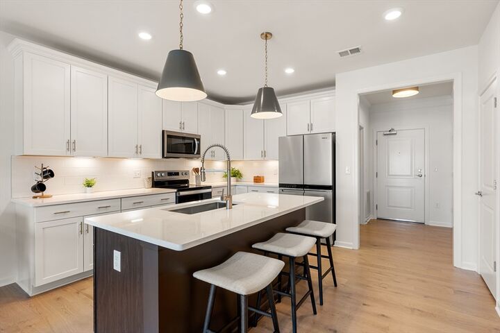 Property Photo:  2 Codman Way 103  MA 01581 