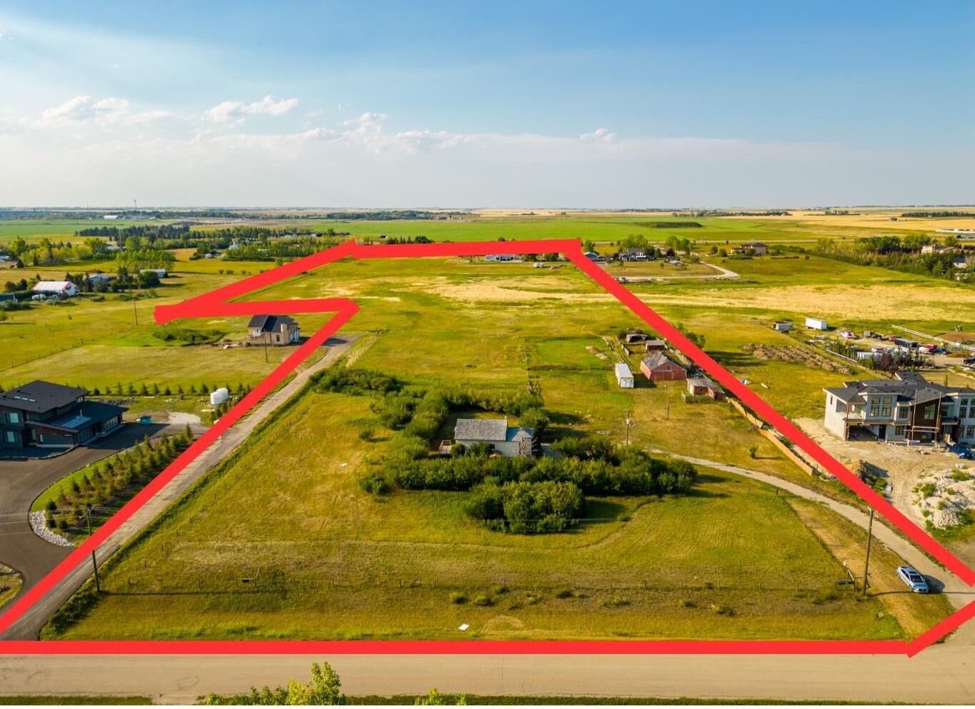 Property Photo:  280156 Township Road 241A  AB T2P 2G7 