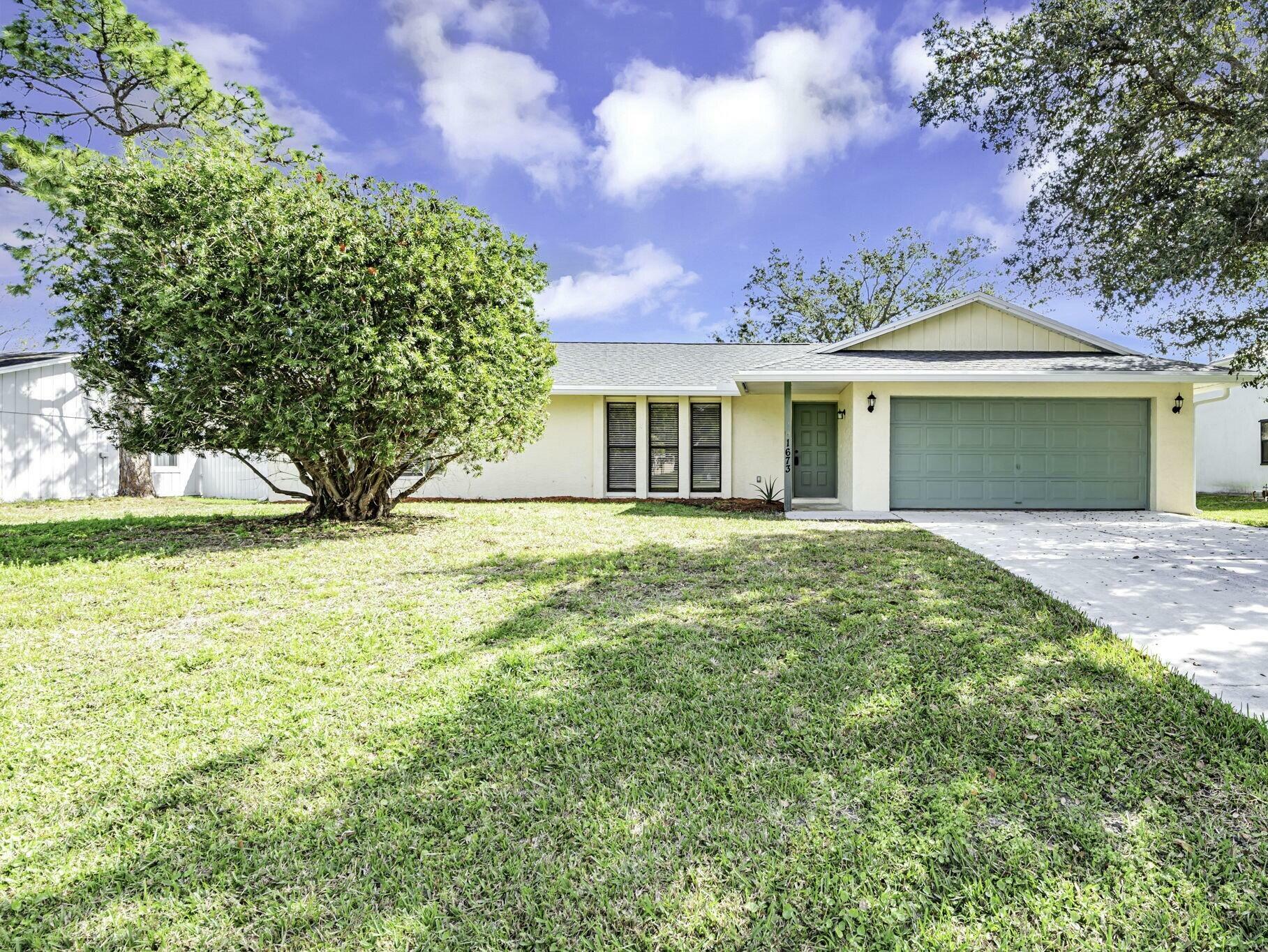 Property Photo:  1673 SE Pleasantview Street  FL 34983 