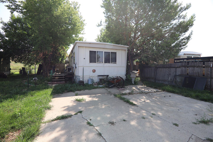 Property Photo:  5901 Coffeen Avenue Lot 63  WY 82801 