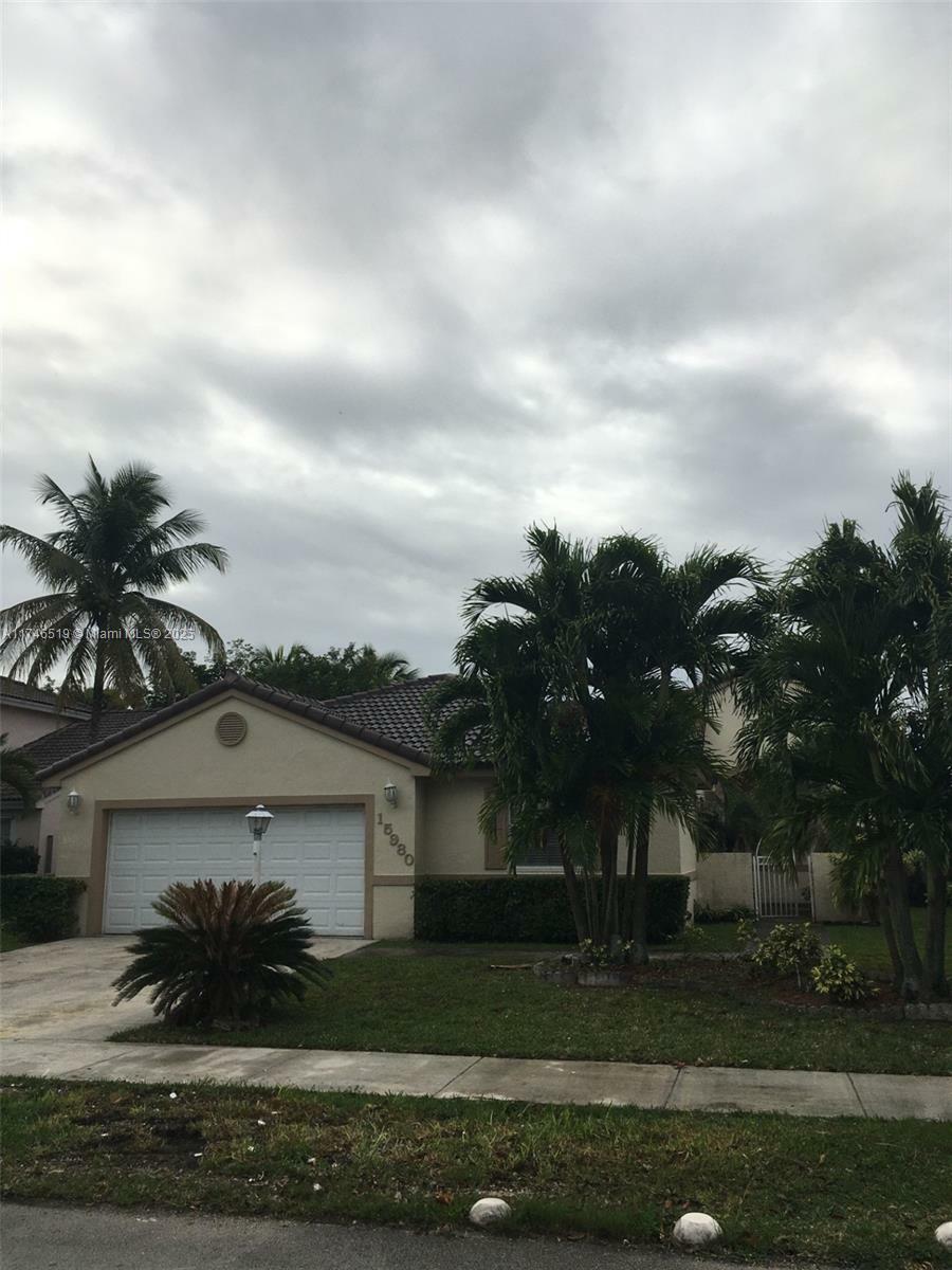 Property Photo:  15980 SW 72nd Ter  FL 33193 