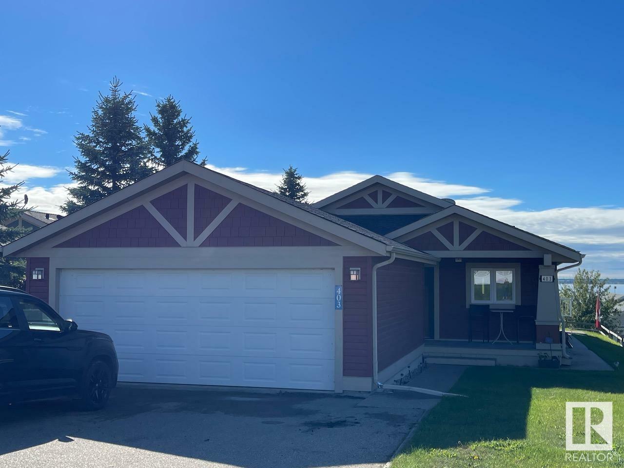 Property Photo:  55101 Ste. Anne Trail 403  AB T0E 1A1 