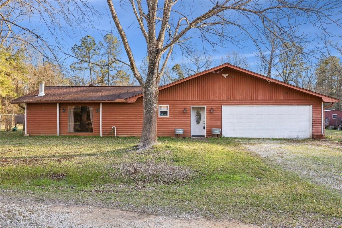 Property Photo: 10336 Oakridge TX 77657