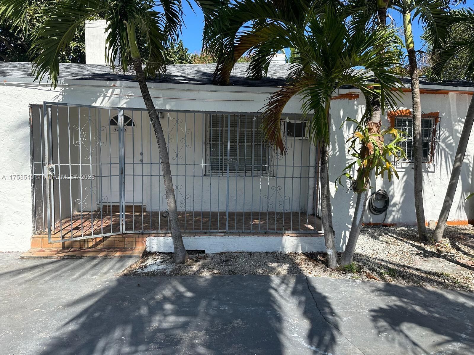 Property Photo: 1443 NW 32nd St FL 33142