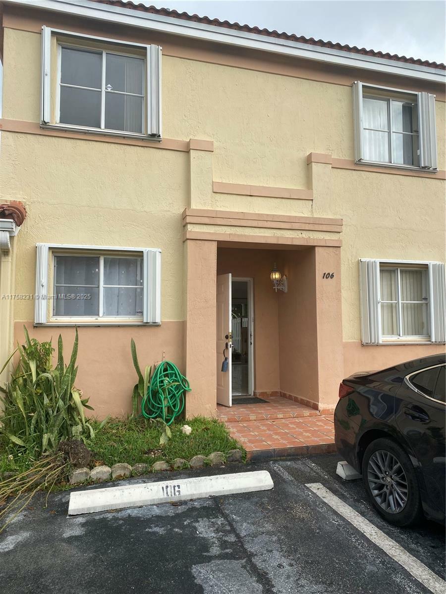 Property Photo:  180 NW 114th Ave 26-106  FL 33172 