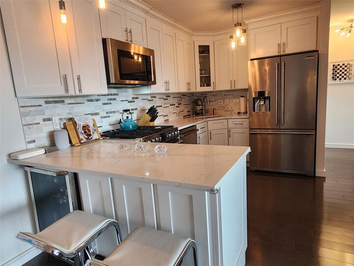 Property Photo: 18-15 215th Street 6 P NY 11360