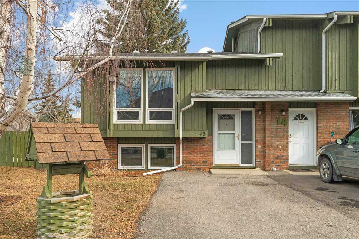 Property Photo: 13 Pekisko Road SW AB T1V 1C6