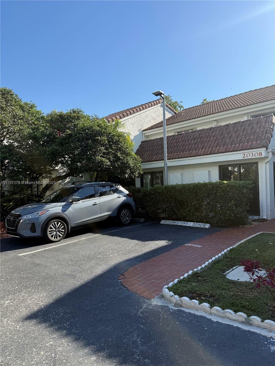 Property Photo: 20306 NE 34th Ct 39 FL 33180