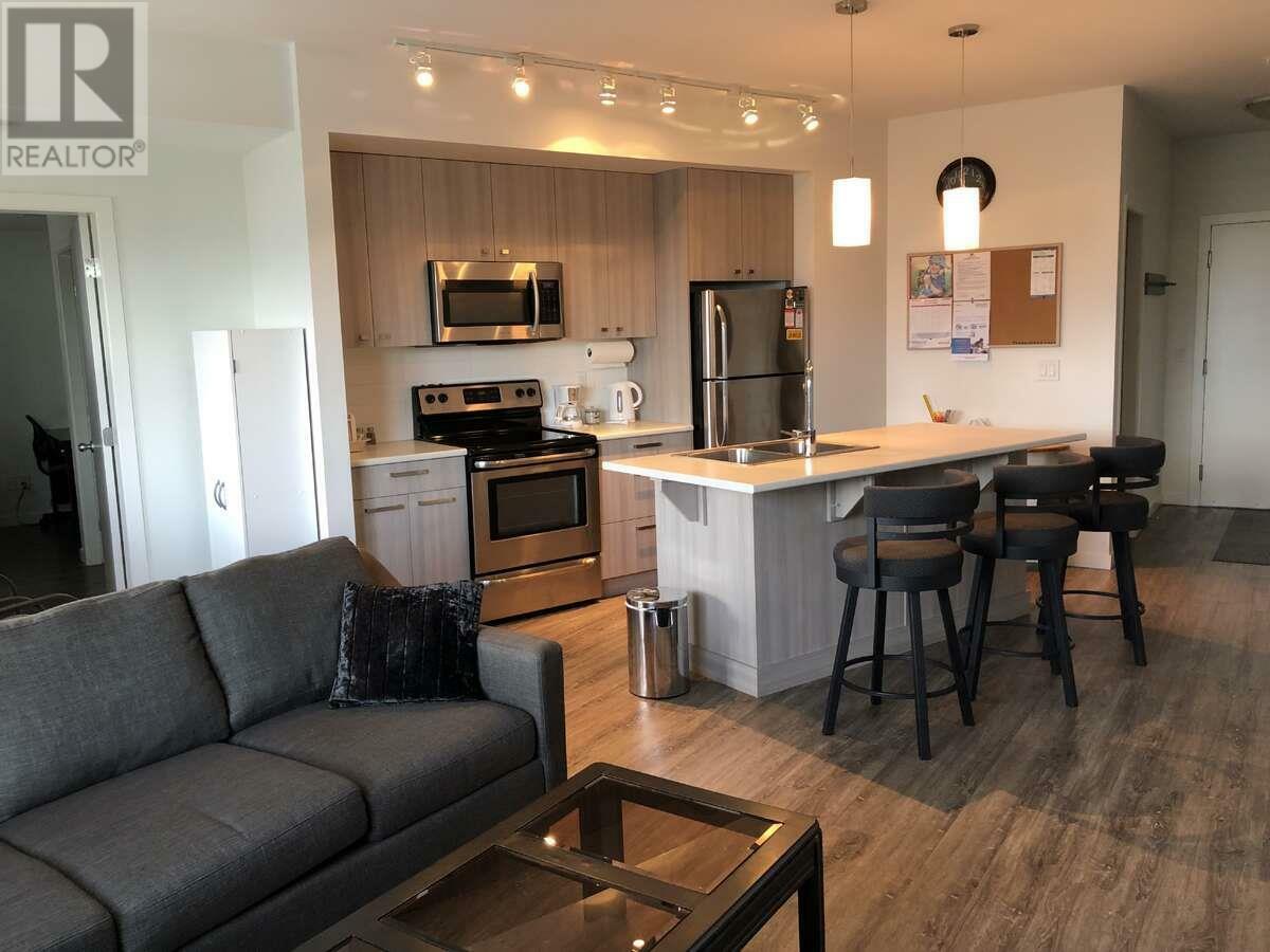 Property Photo: 935 Academy Way 207 BC V1V 3C9