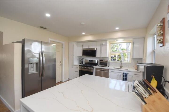 Property Photo:  981 SW 32nd St  FL 33315