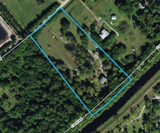 Property Photo:  4810 Windmill Road  FL 33470 
