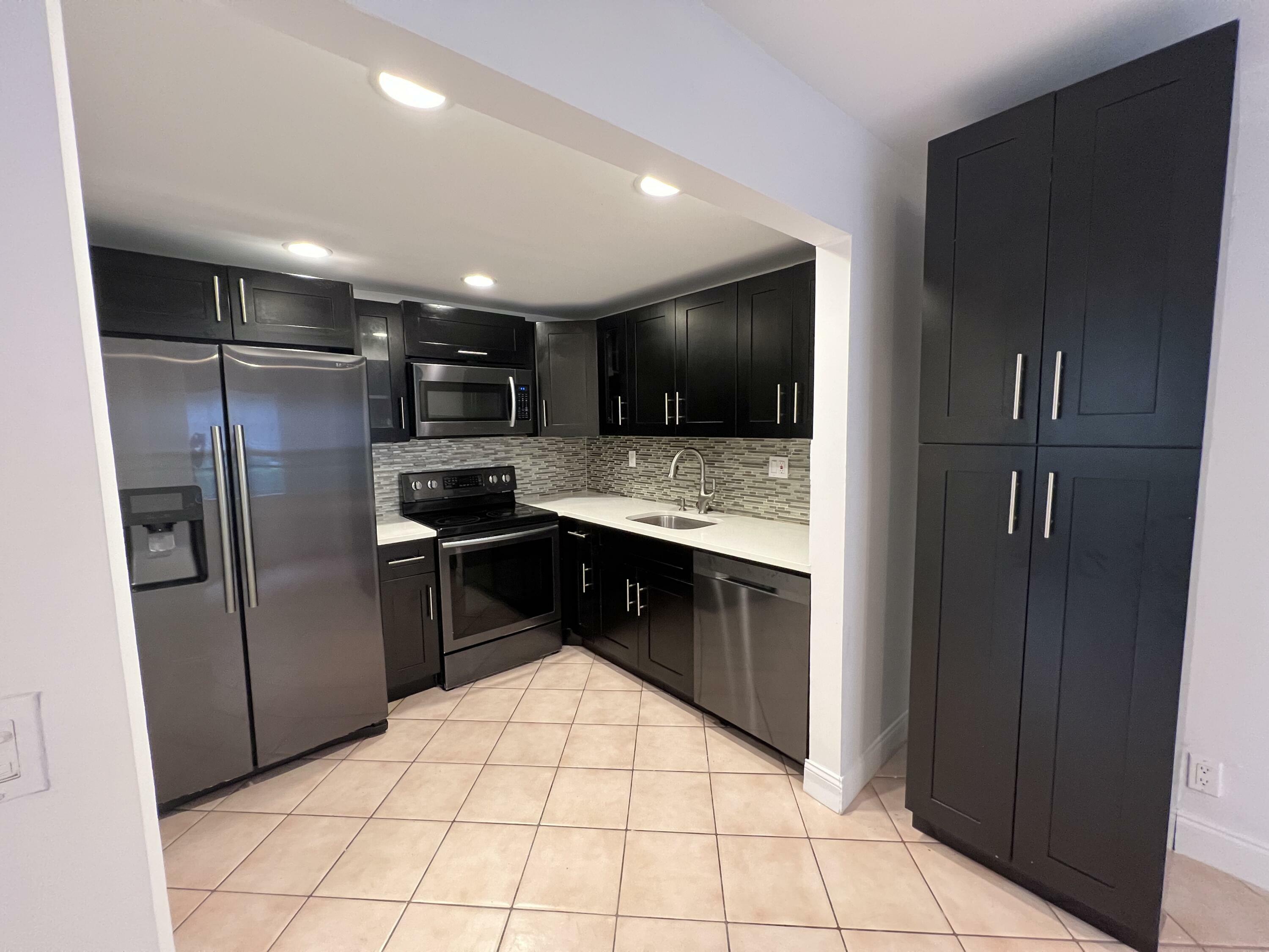 Property Photo: 679 Normandy O FL 33484