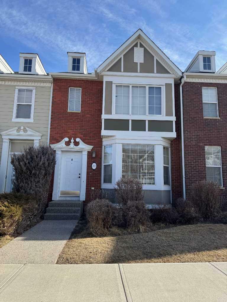 Property Photo: 217 Rainbow Falls Drive AB T1X 0A7