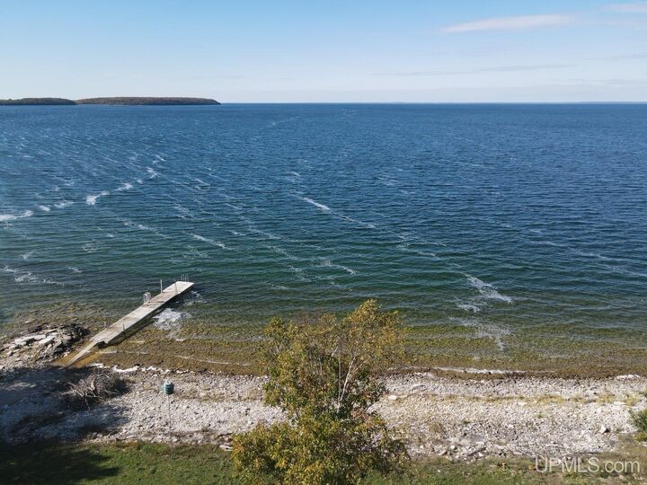 Property Photo:  7005 Mm.5 Lane  MI 49835 