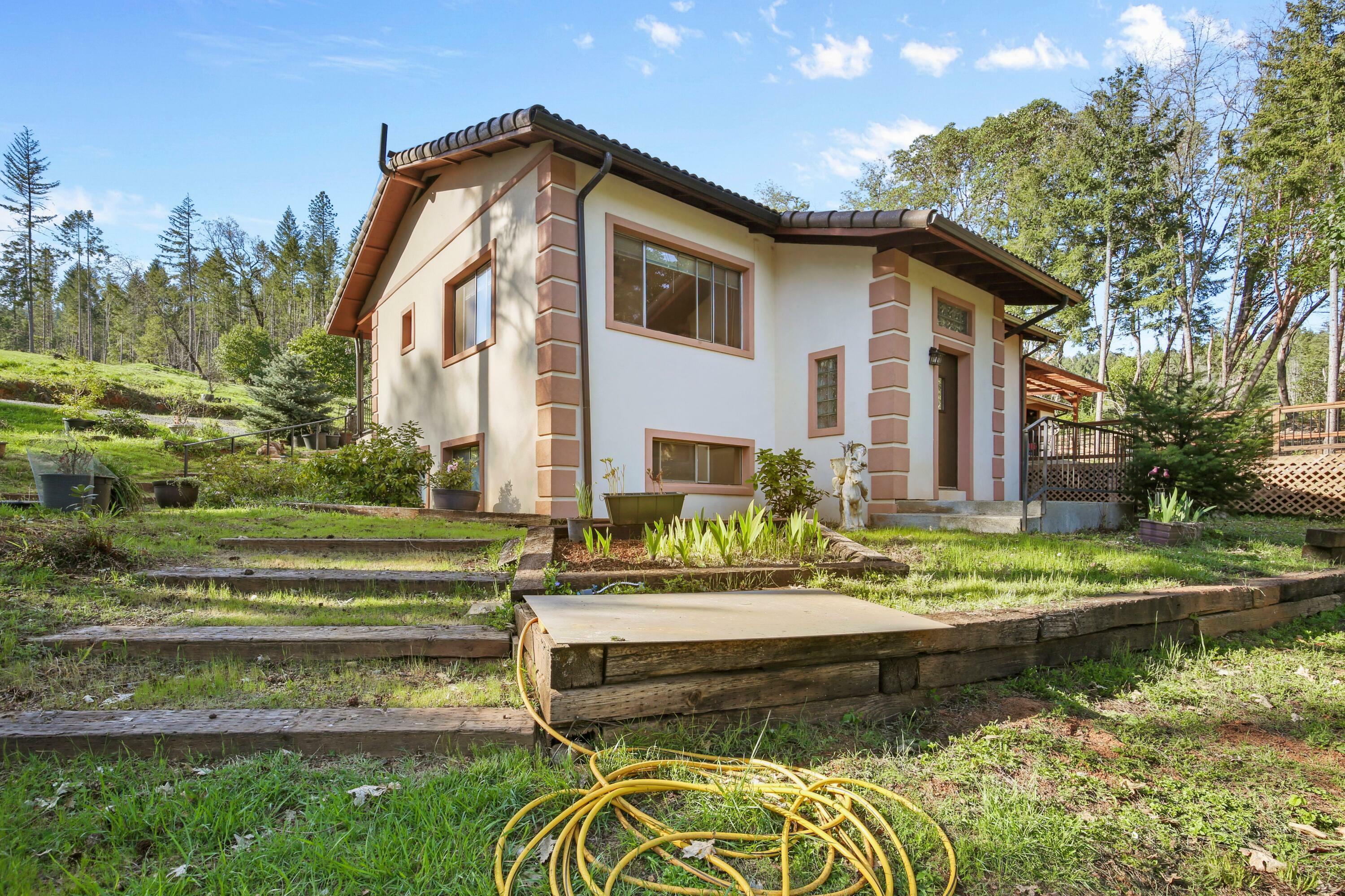Property Photo: 4884 Lower Grave Creek Road OR 97497