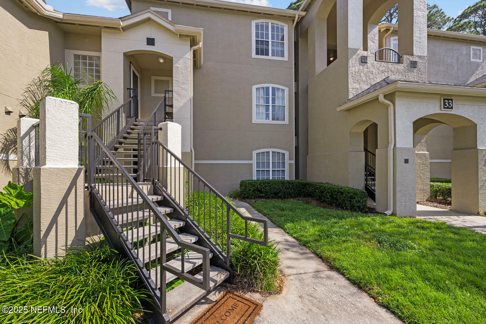 Property Photo: 1655 The Greens Way 3321 FL 32250