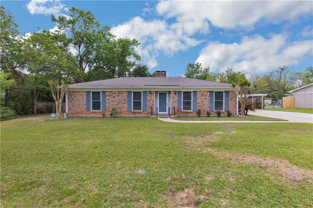 Property Photo: 6561 Sandra Drive AL 36582