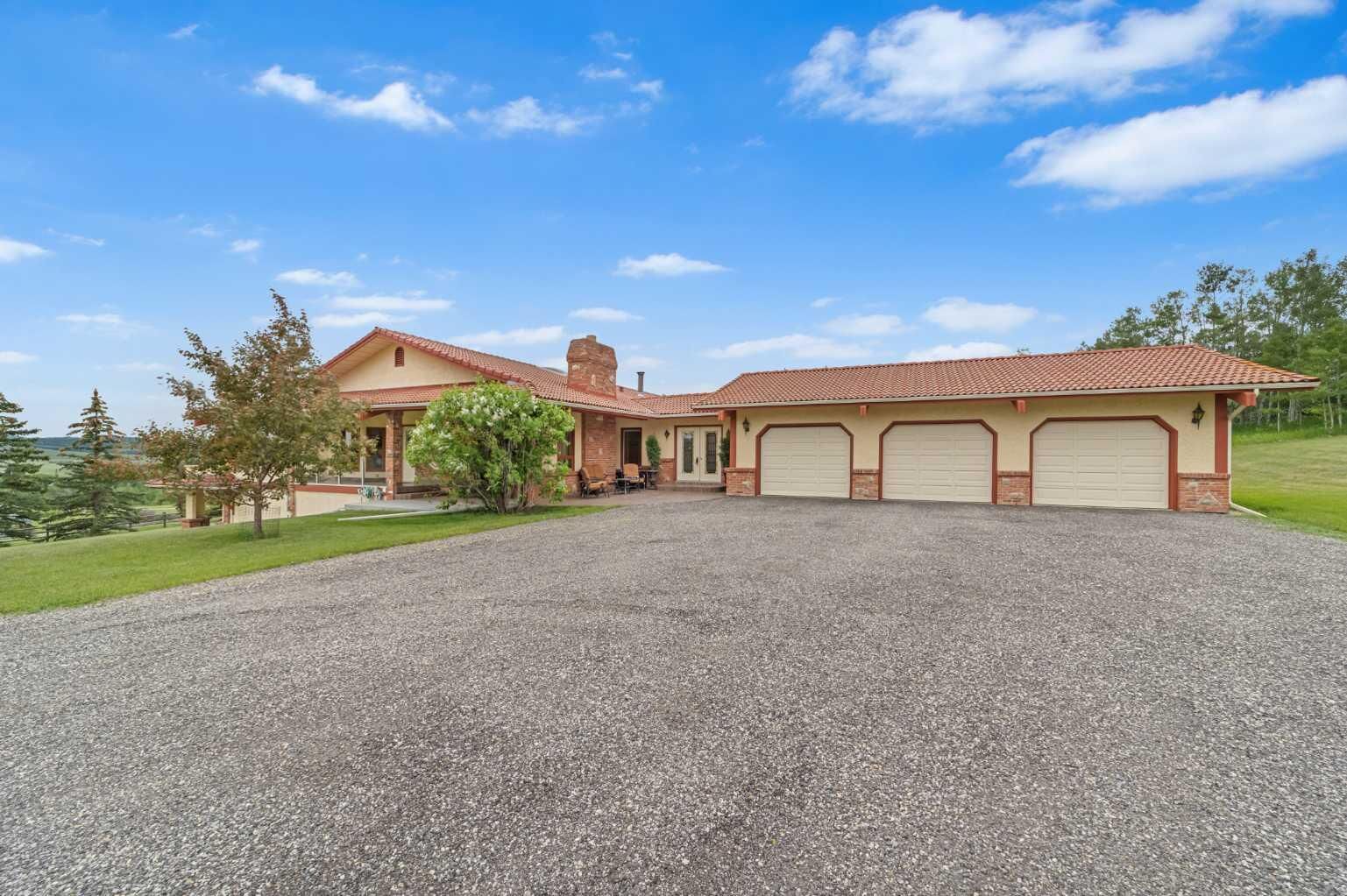 Property Photo: 80054 226 Avenue W 100 AB T1S 2Z1