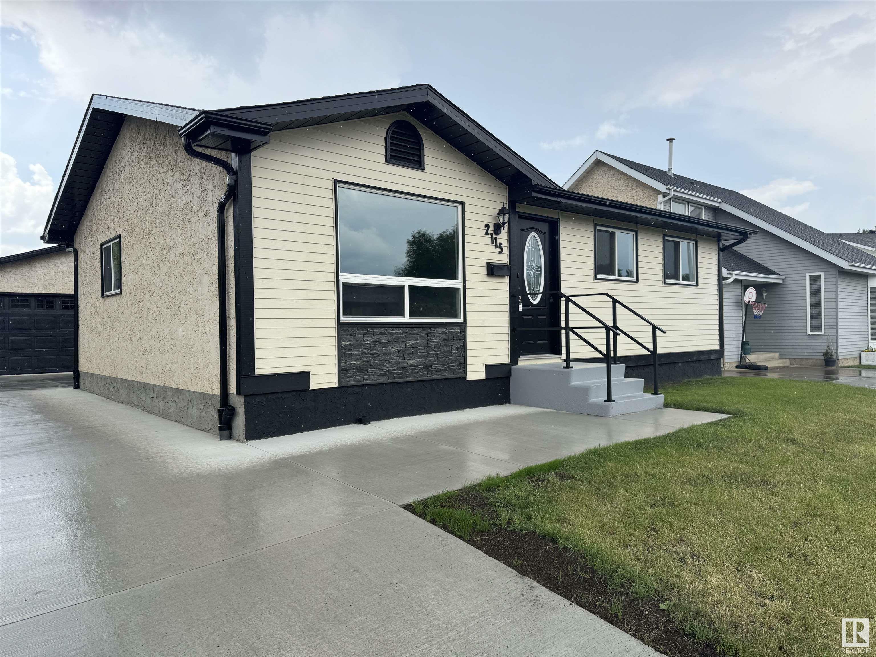 Property Photo: 2115 145 Avenue NW AB T5Y 1V1