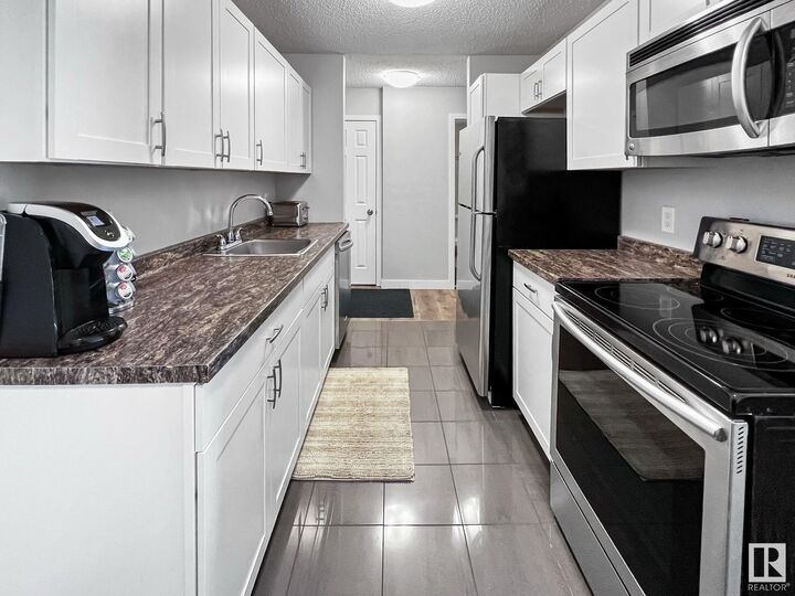 Property Photo:  10617 107 Street NW 201  AB T5H 2Y8 