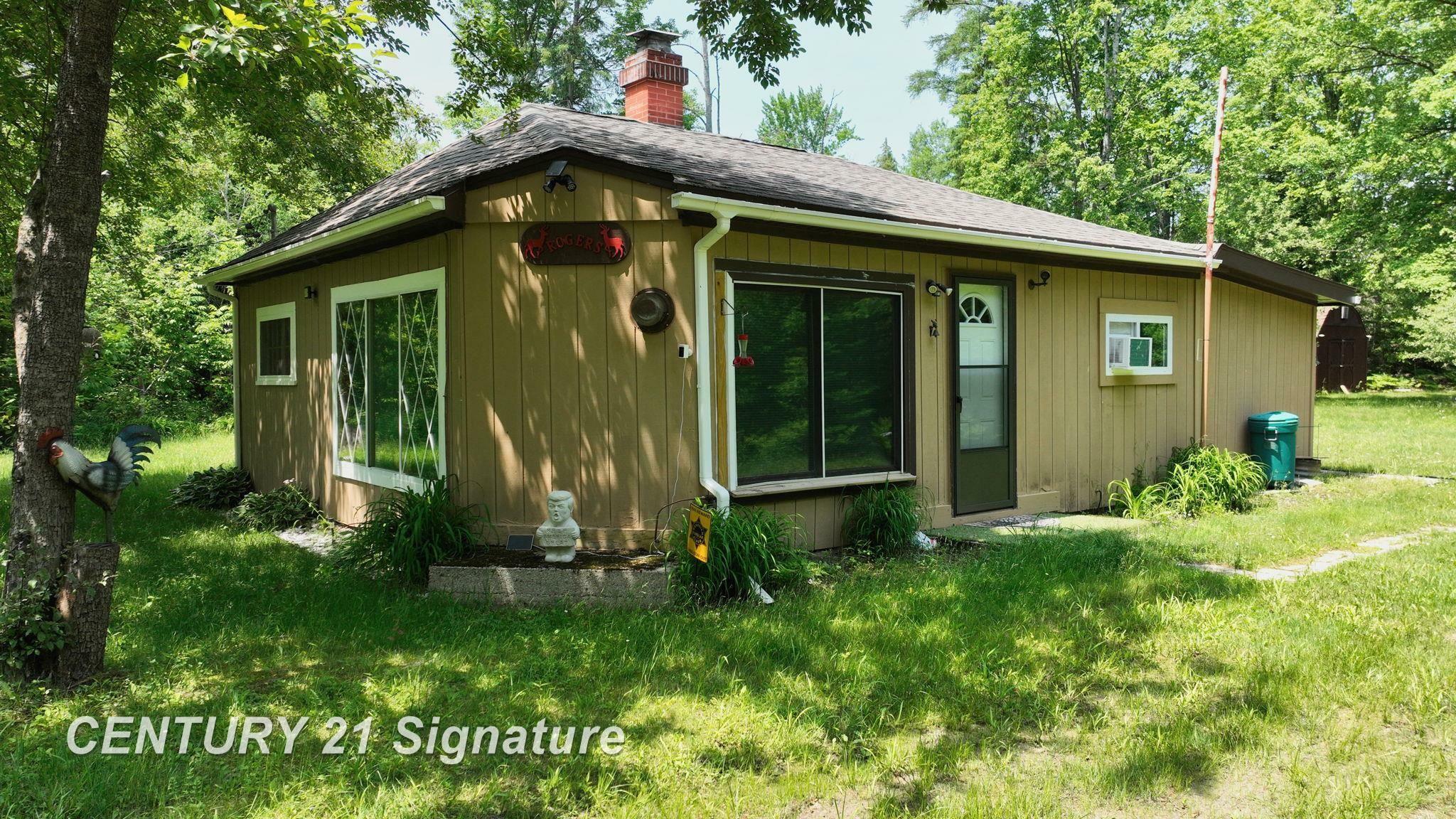 Property Photo: 6002 Wildwood Drive MI 48610