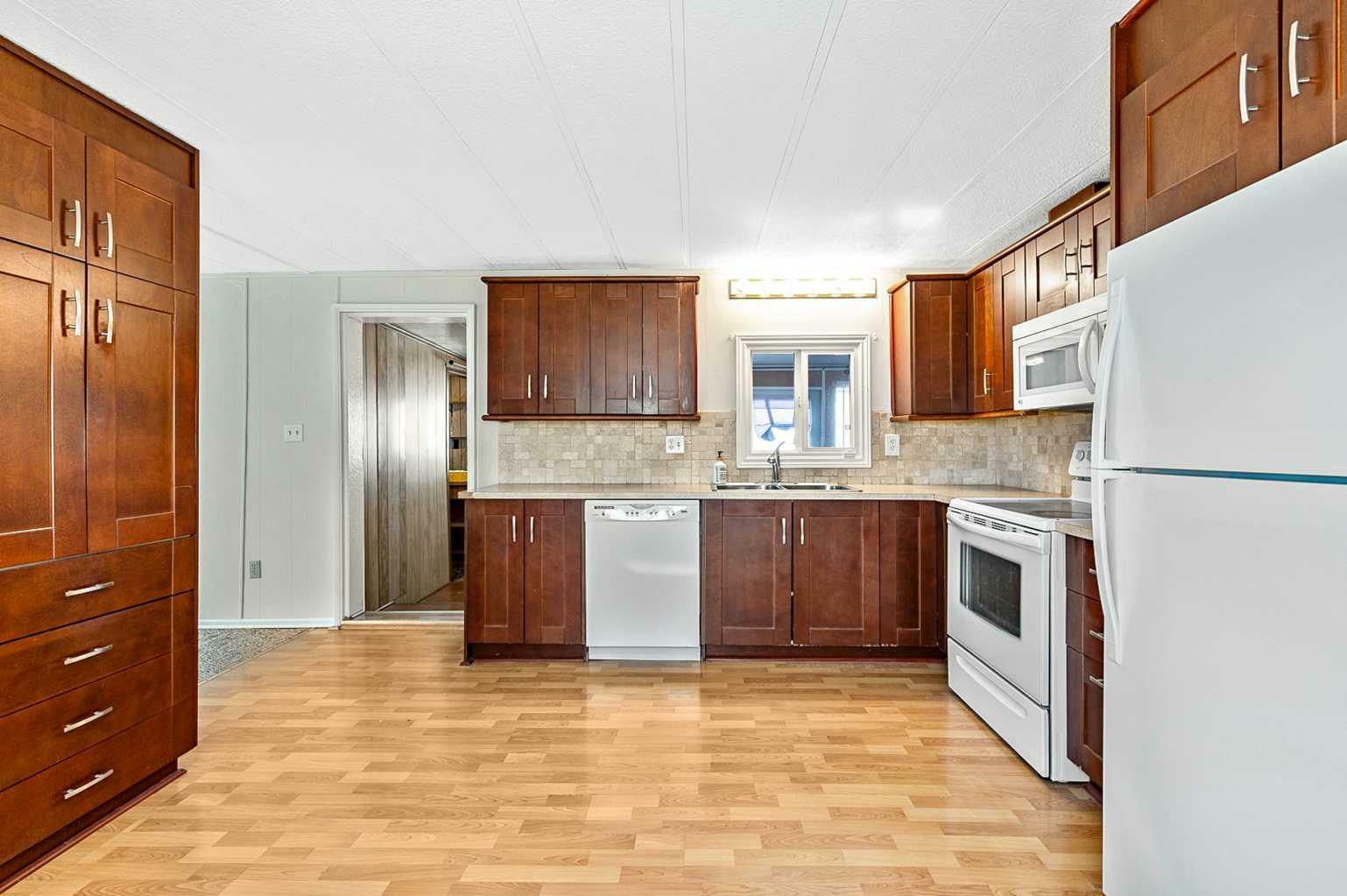 Property Photo: 106 Home Bay SE AB T1V 1J7