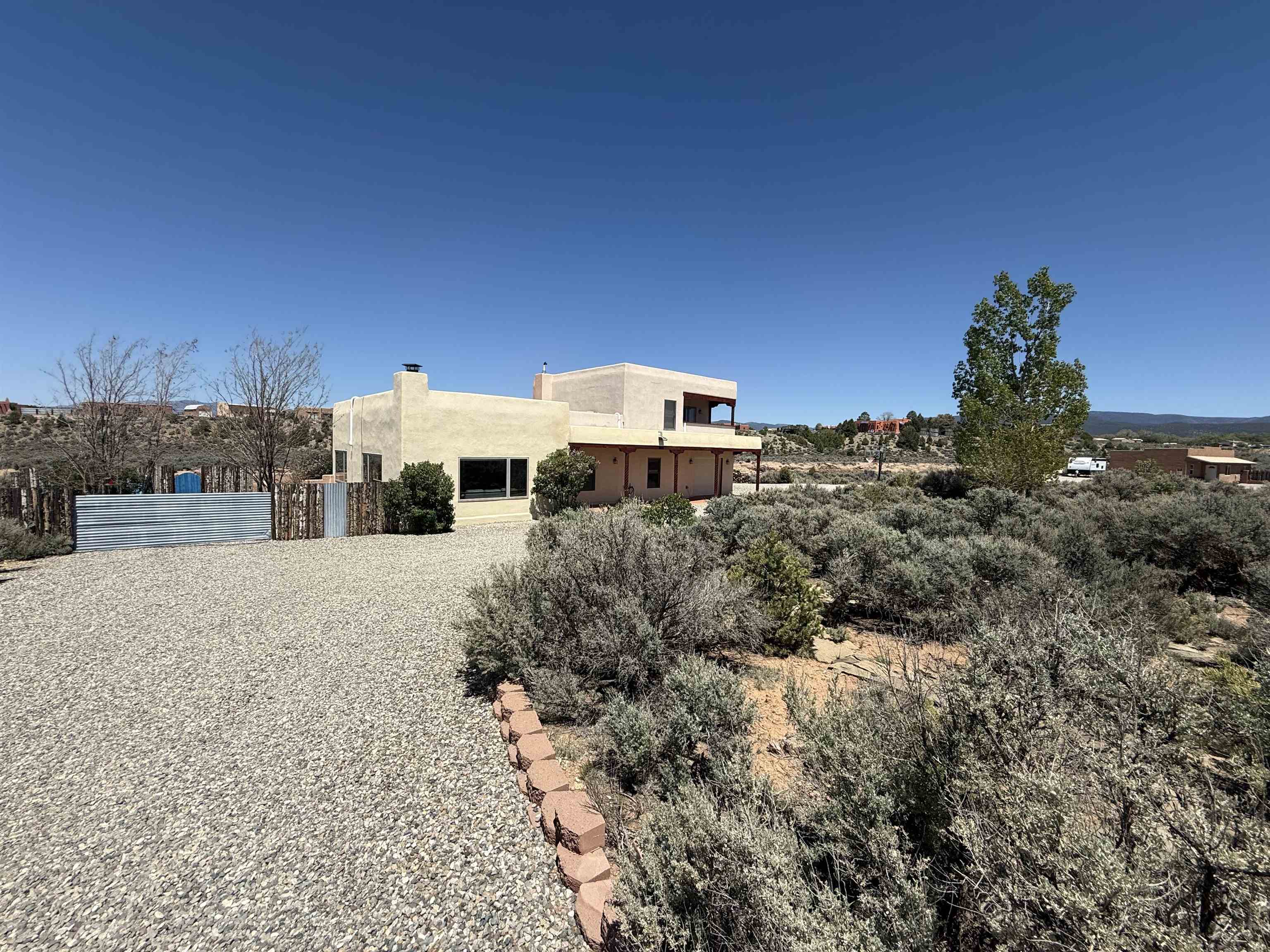Property Photo:  70 Camino De Los Arroyos  NM 87557 