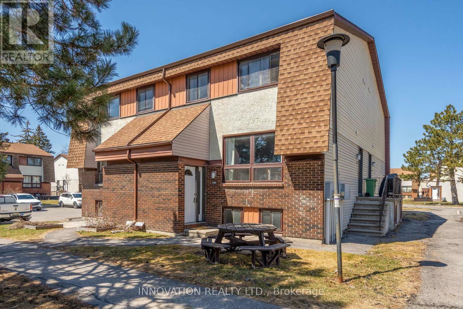 Property Photo: 20 Woodvale Green B ON K2G 4H2
