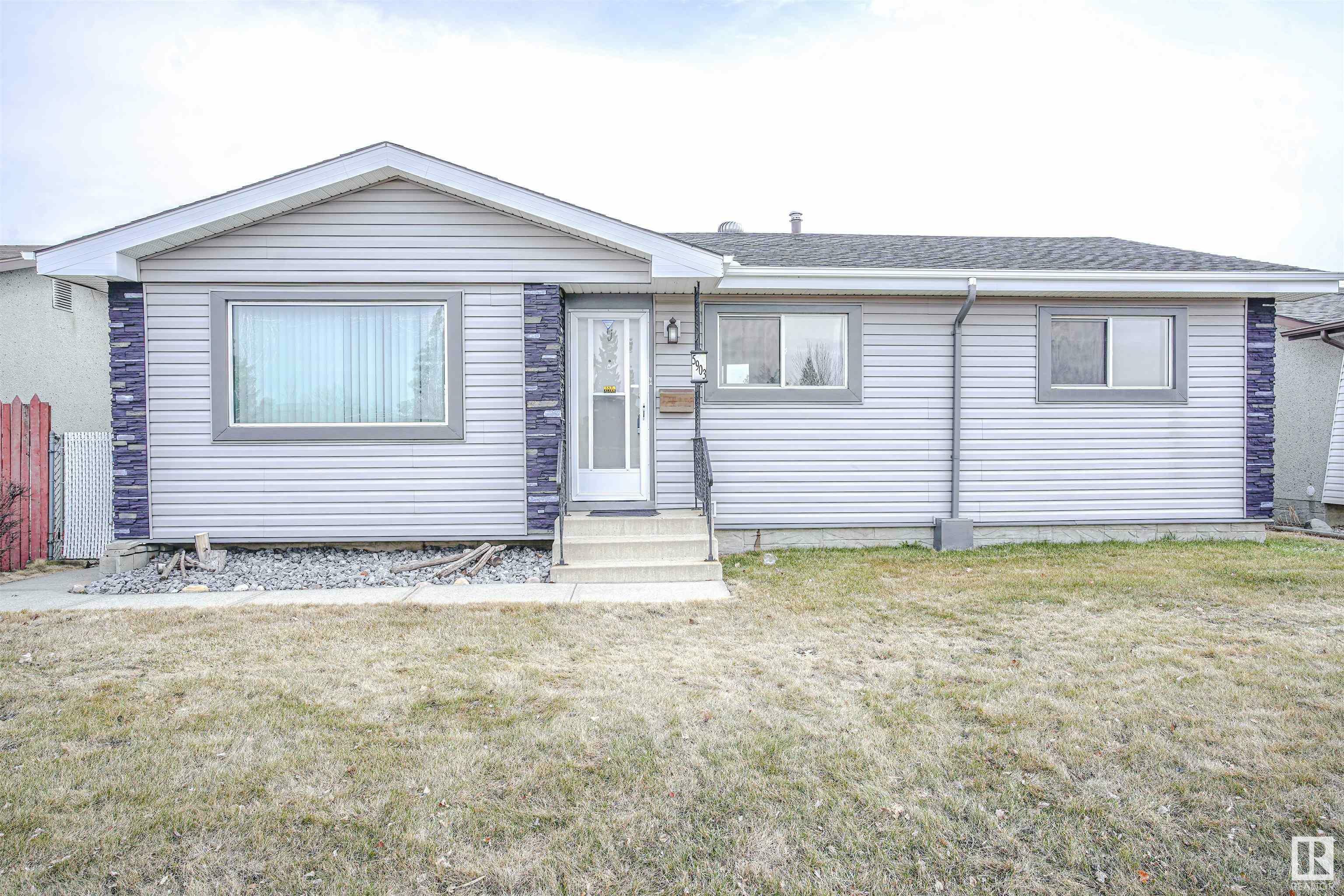 Property Photo: 5903 144 Avenue NW AB T5A 1K7