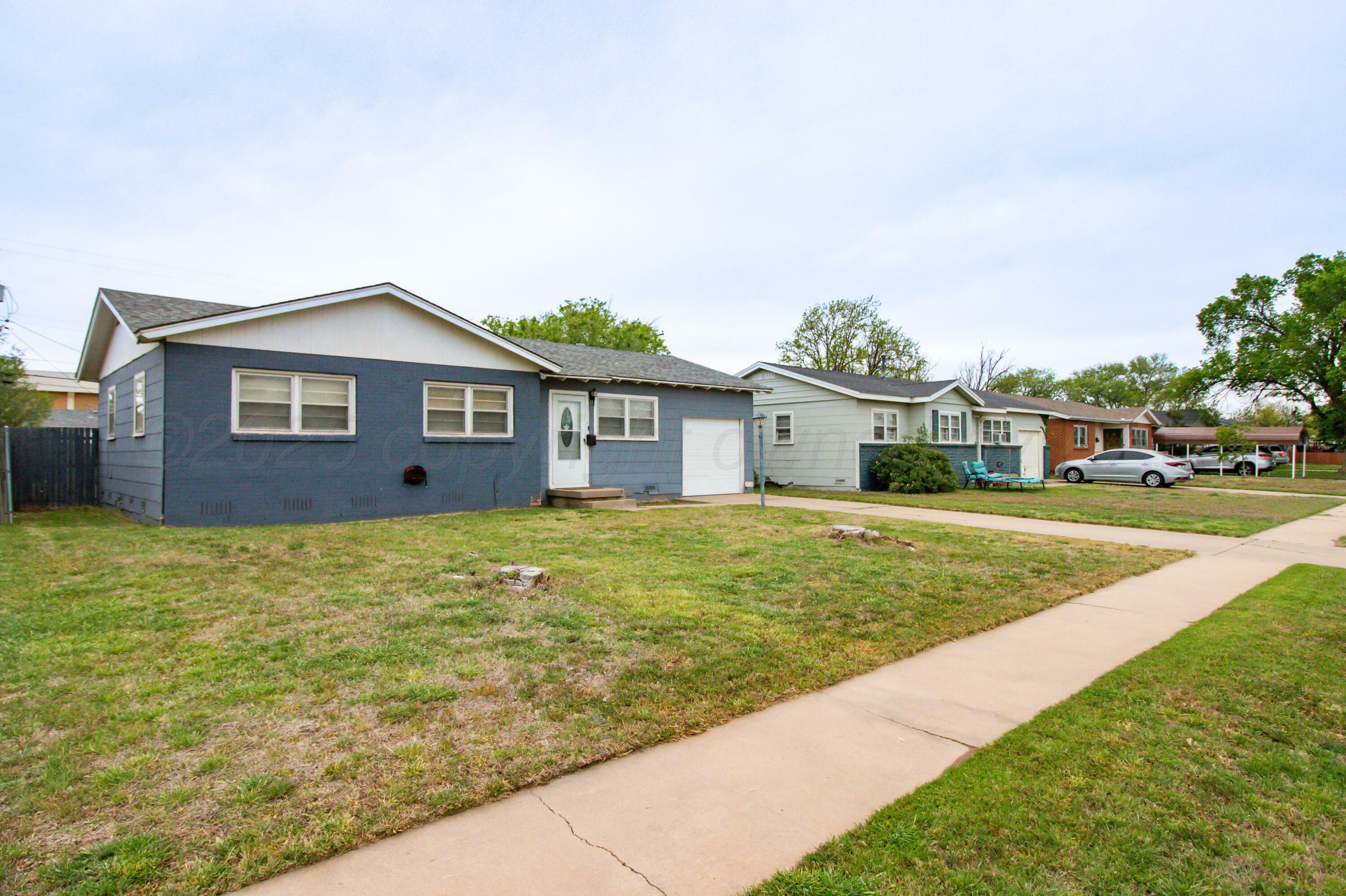 Property Photo: 3114 S Woodland Street TX 79103