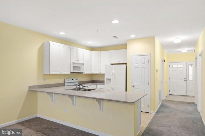 Property Photo:  17476 Slipper Shell Way 14  DE 19958 