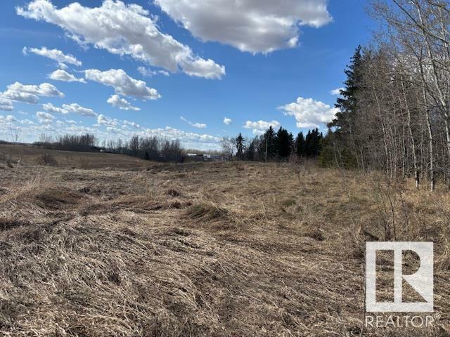 Property Photo:  2103 Ellerslie Road SW  AB T6X 1A7 