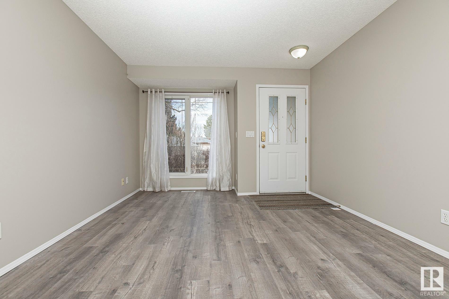 Property Photo: 8107 85 Street NW AB T6C 4S3
