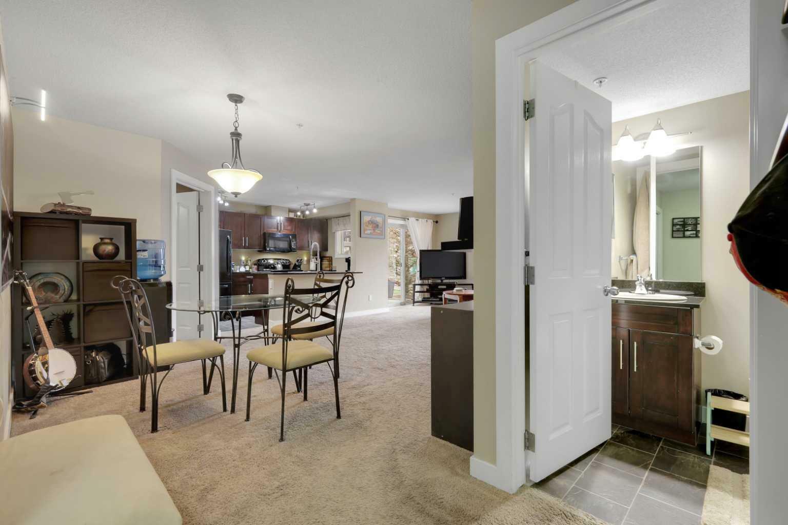 Property Photo: 403 Mackenzie Way SW 2106 AB T4B 3V7