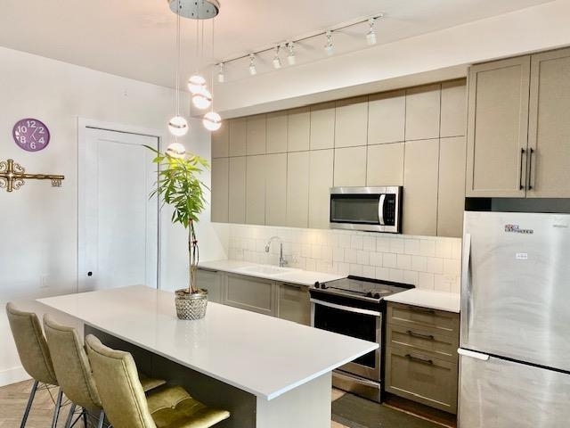 Property Photo: 17578 57A Avenue 103 BC V3S 7V2