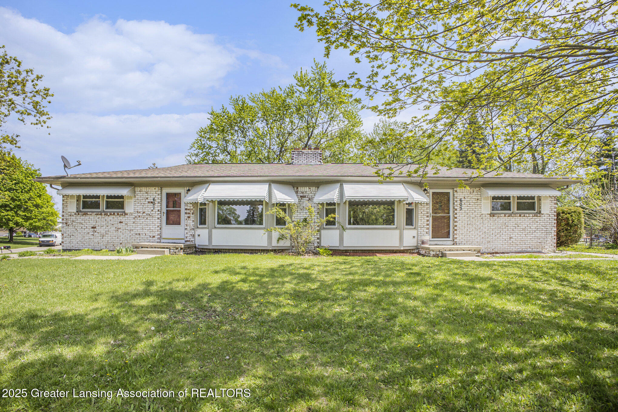 Property Photo: 601/603 Farmstead Lane MI 48917