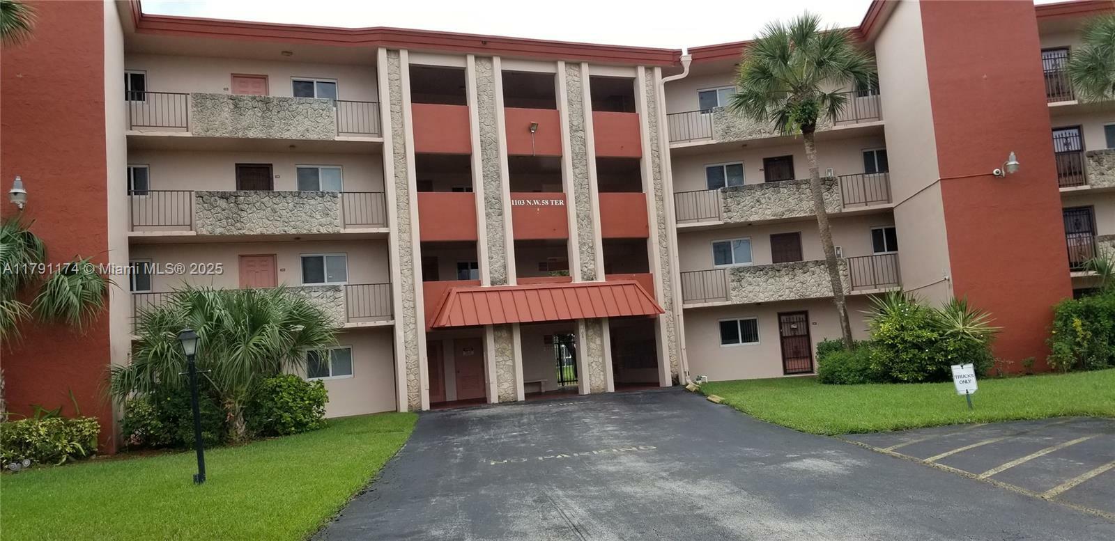 Property Photo:  1103 NW 58th Ter 321  FL 33313 