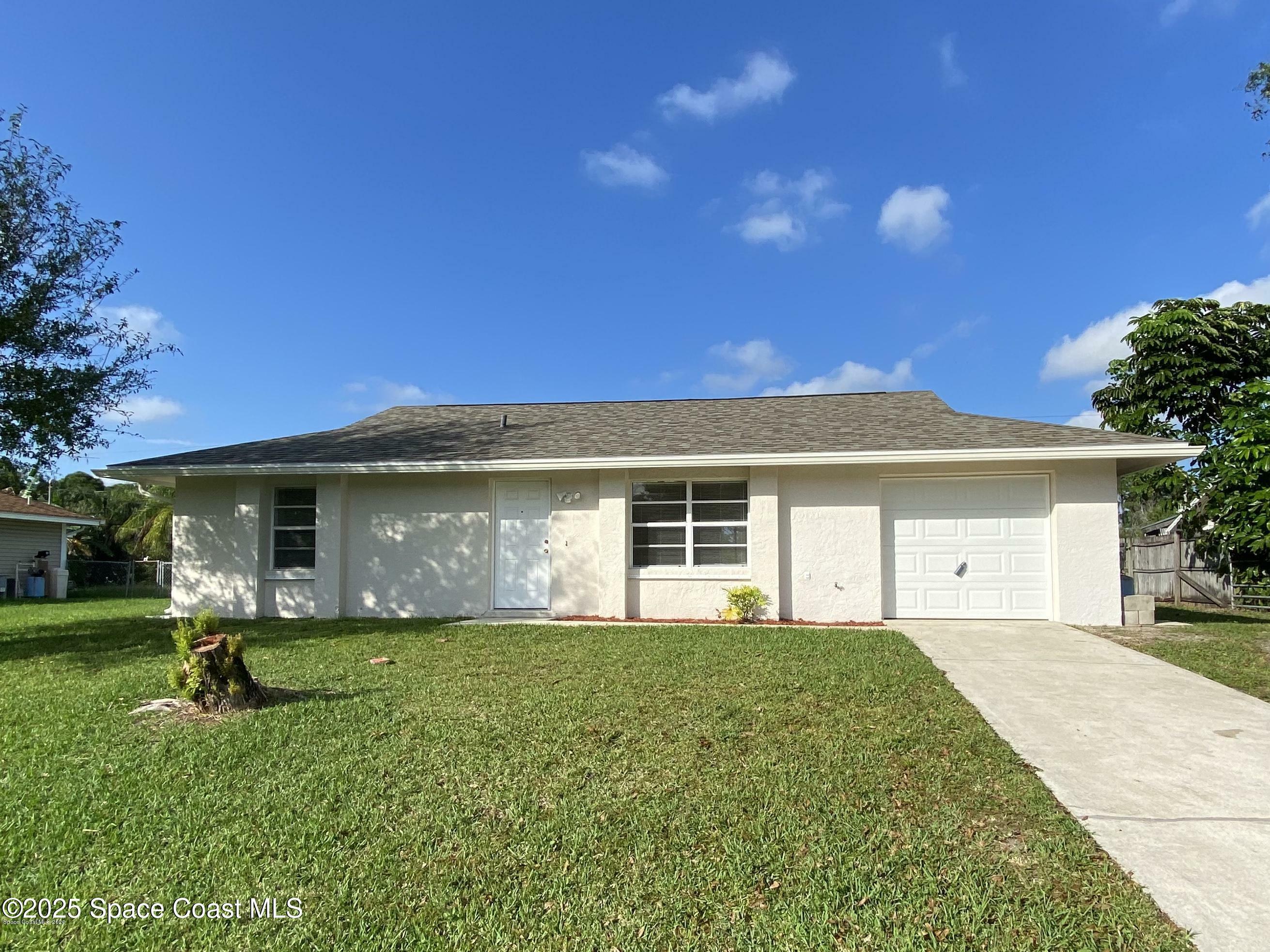 Property Photo: 499 Brickell Street SE FL 32909