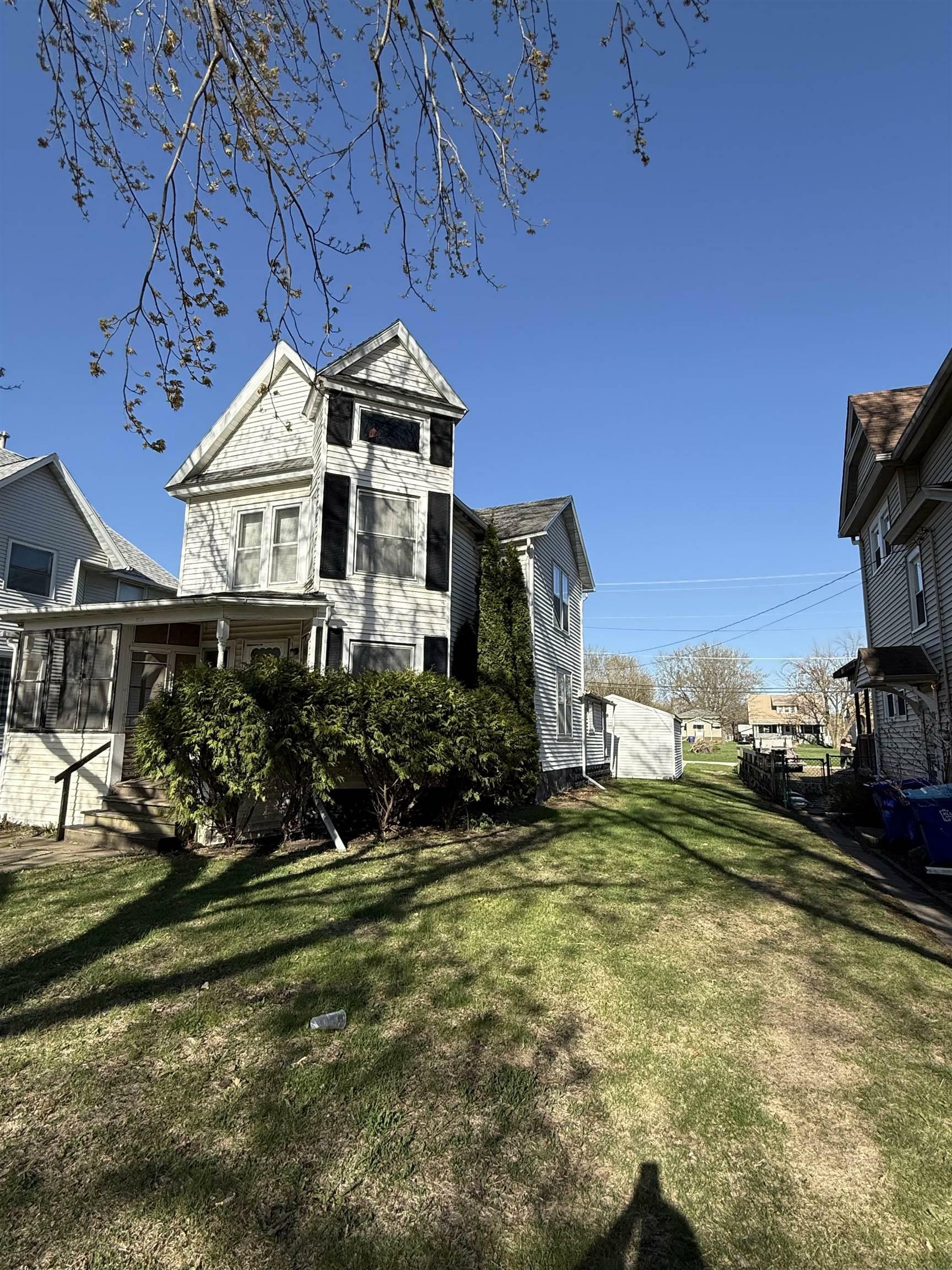 Property Photo: 215 1 St Ave NE IA 50662