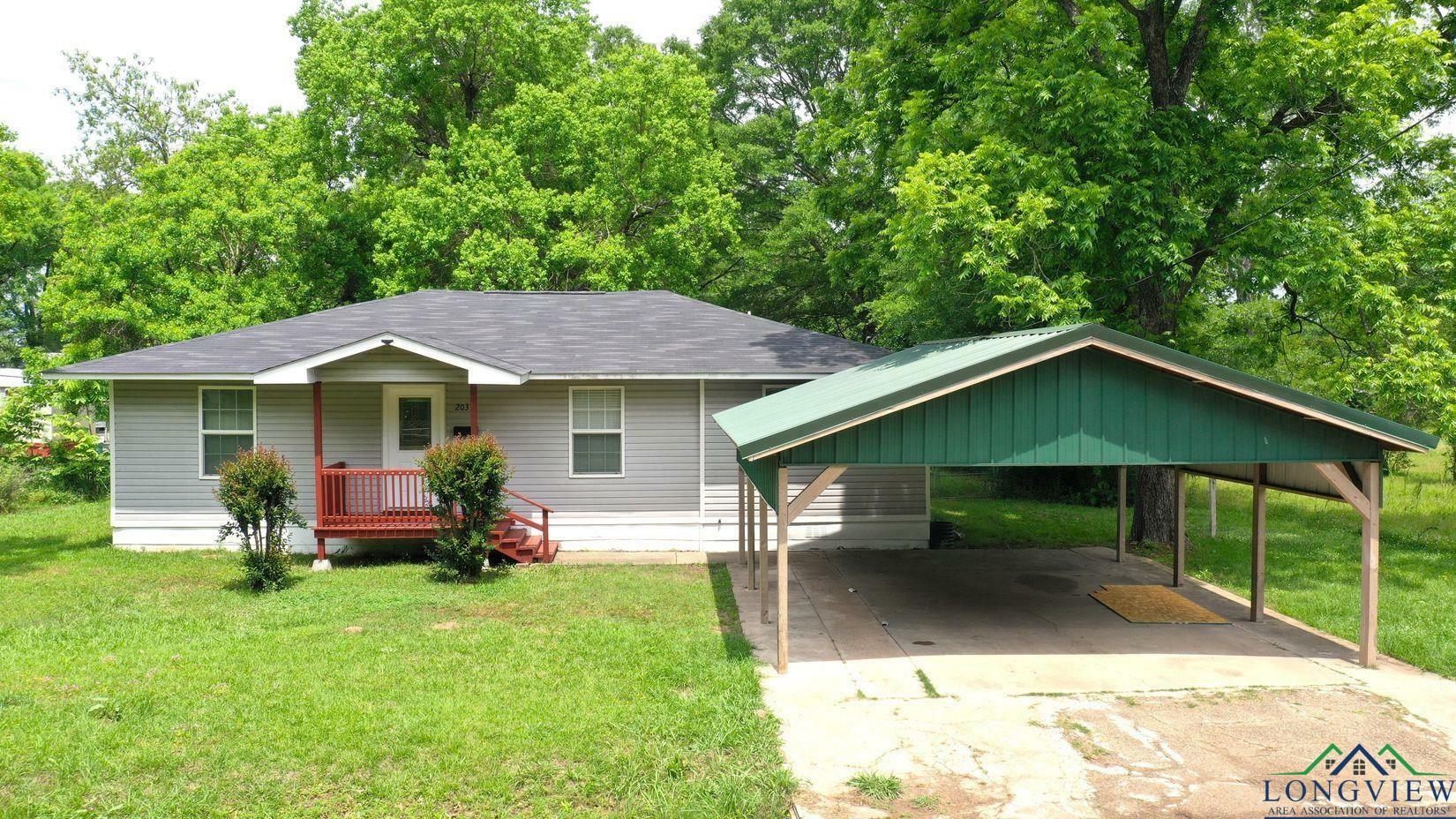 Property Photo: 203 E Douglas Street TX 75657