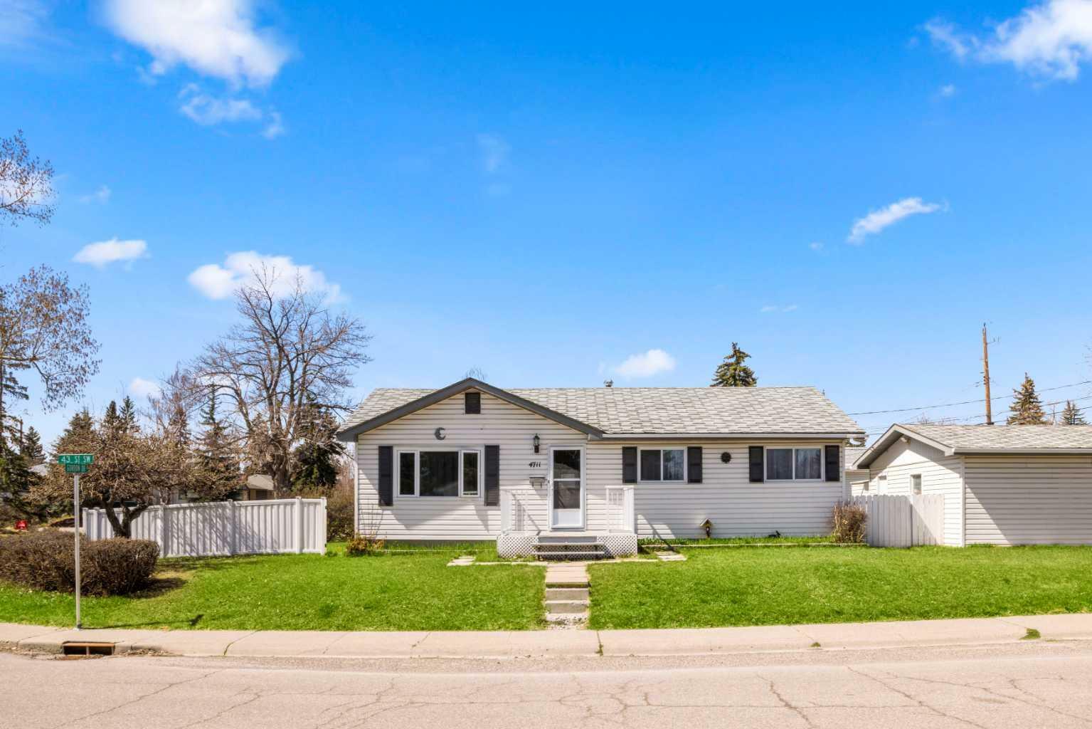 Property Photo: 4711 43 Street SW AB T3E 3P9