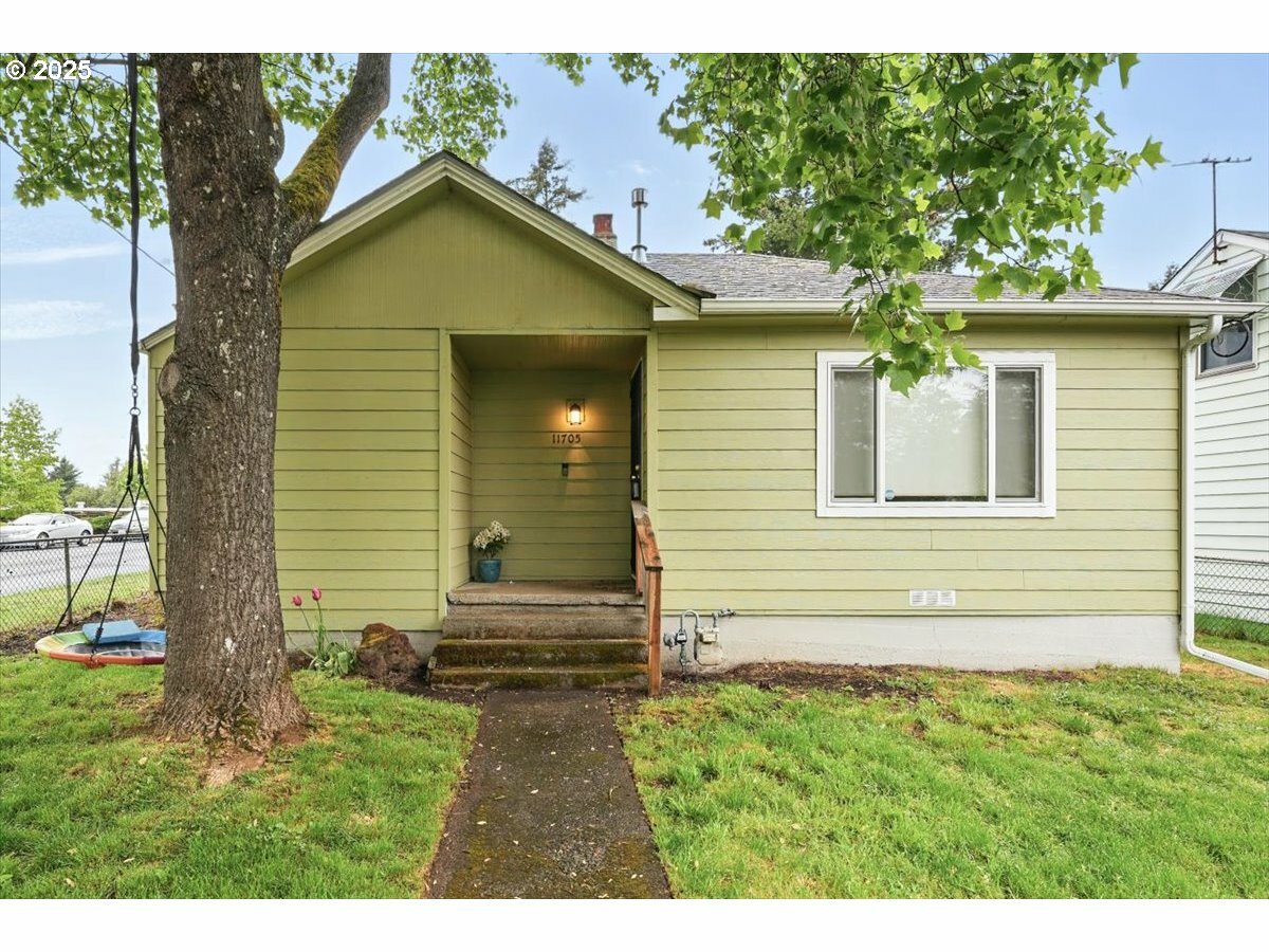 Property Photo:  11705 SE Pine St  OR 97216 