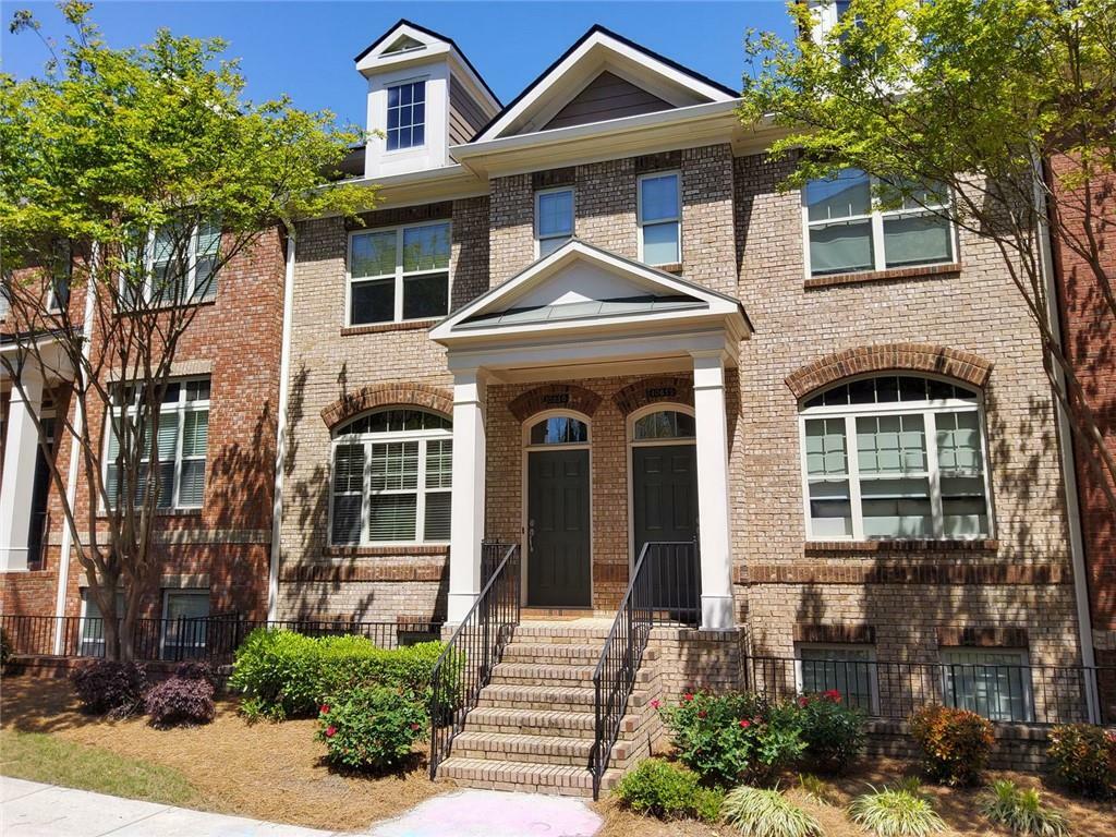 Property Photo: 10856 Ellicot Way GA 30022